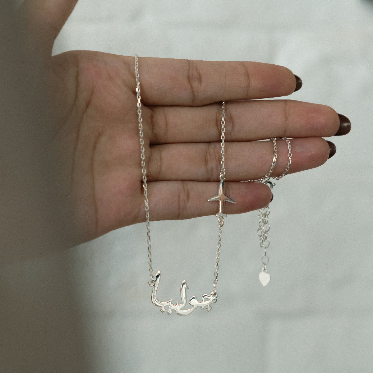 Necklace with airplane charm in UAE