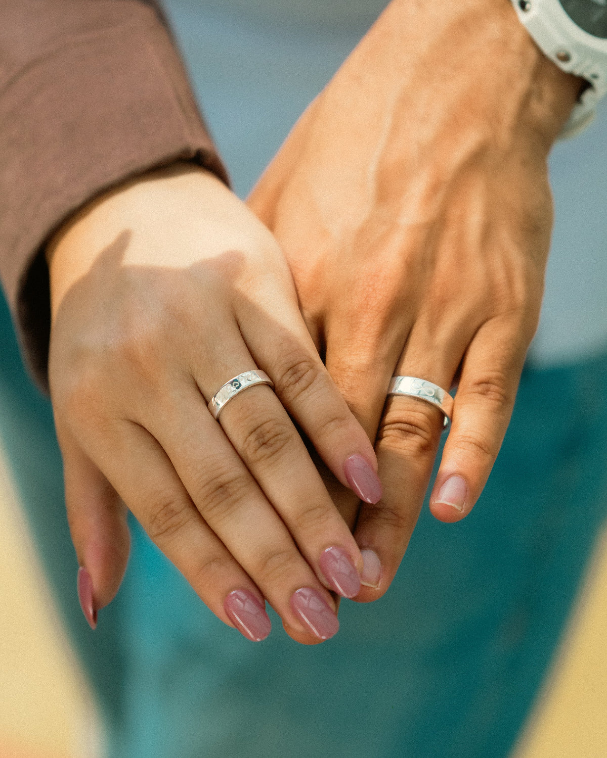 Silver Couple ring Set with polished surface on hands