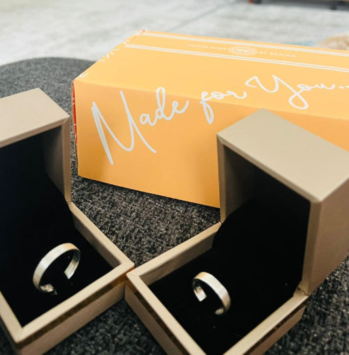 Silver wedding rings with name date engraving in dubai