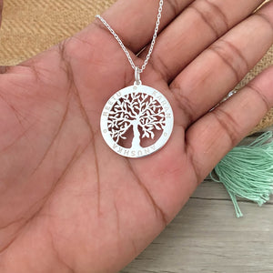 Silver necklace with family tree and names