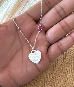 Arabic necklace with word Mother on it