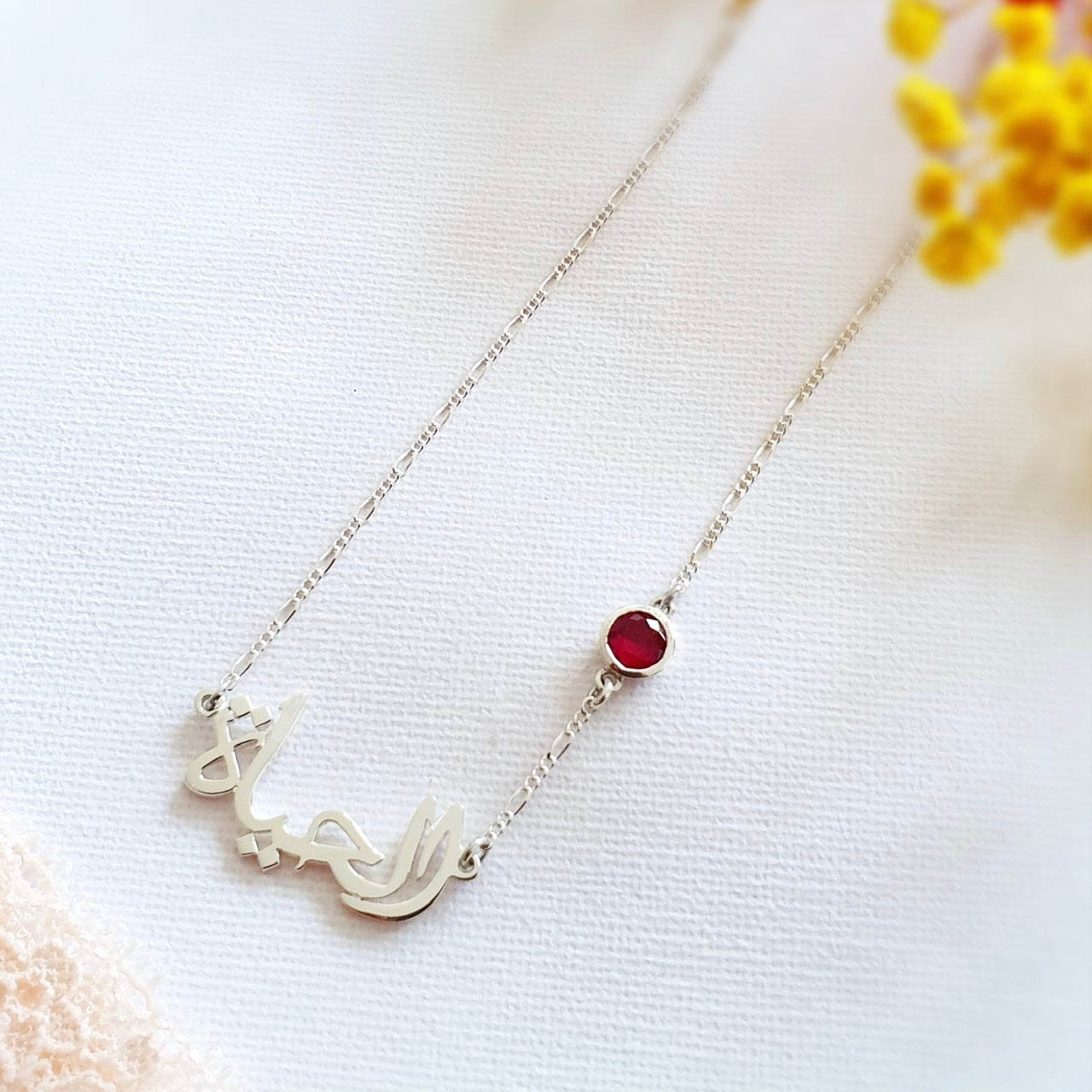 Customised Arabic name necklace with red stoneim dubai