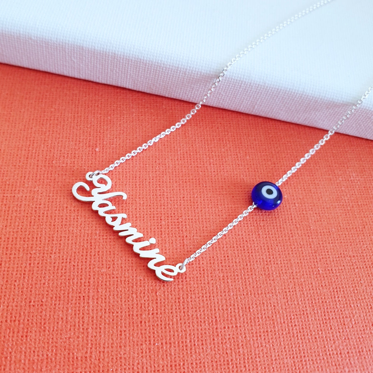 Customised name necklace with Blue Eye in Dubai Abudhabi UAE