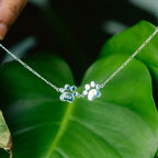 Bracelet with 2 paw shaped charms in silver 