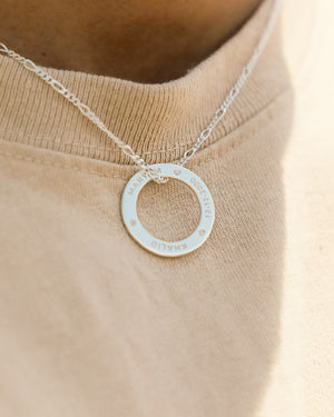 round ring necklace for men with engraving of date and names