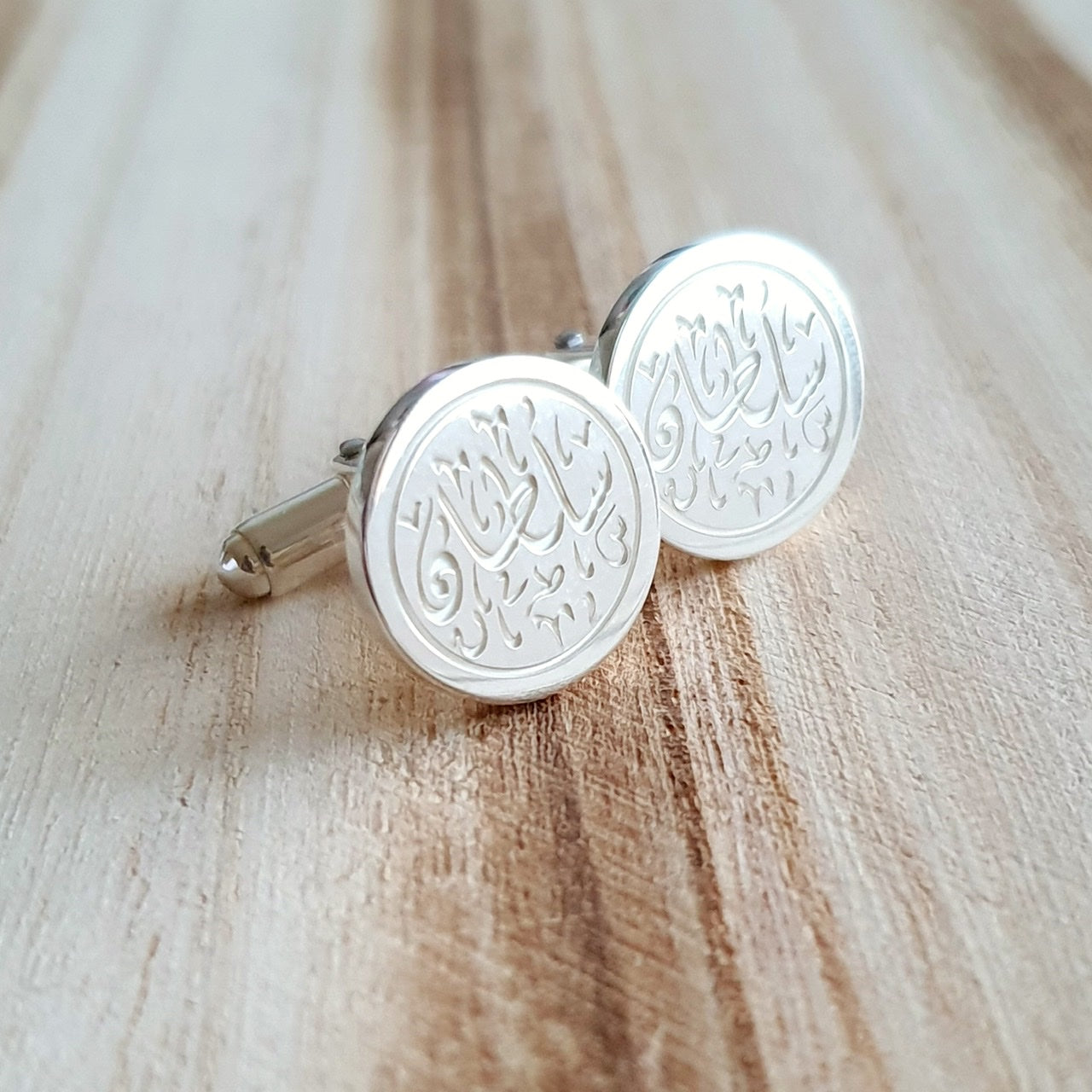 Round shape cufflinks with arabic name in Dubai
